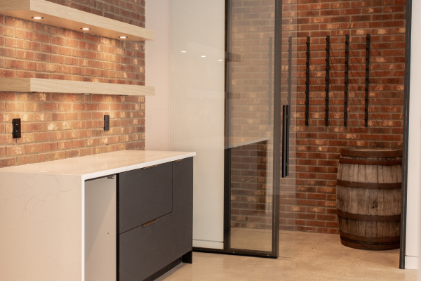 Indoor masonry work showcasing brick installation on interior wall by Edmonton contractors.