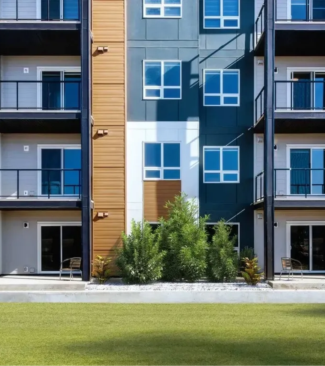 Modern apartment building with contemporary exterior design and siding in Edmonton.